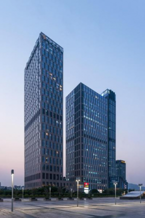 Отель Guangzhou Yicheng Poly Central Pivot apartment  Гуанчжоу